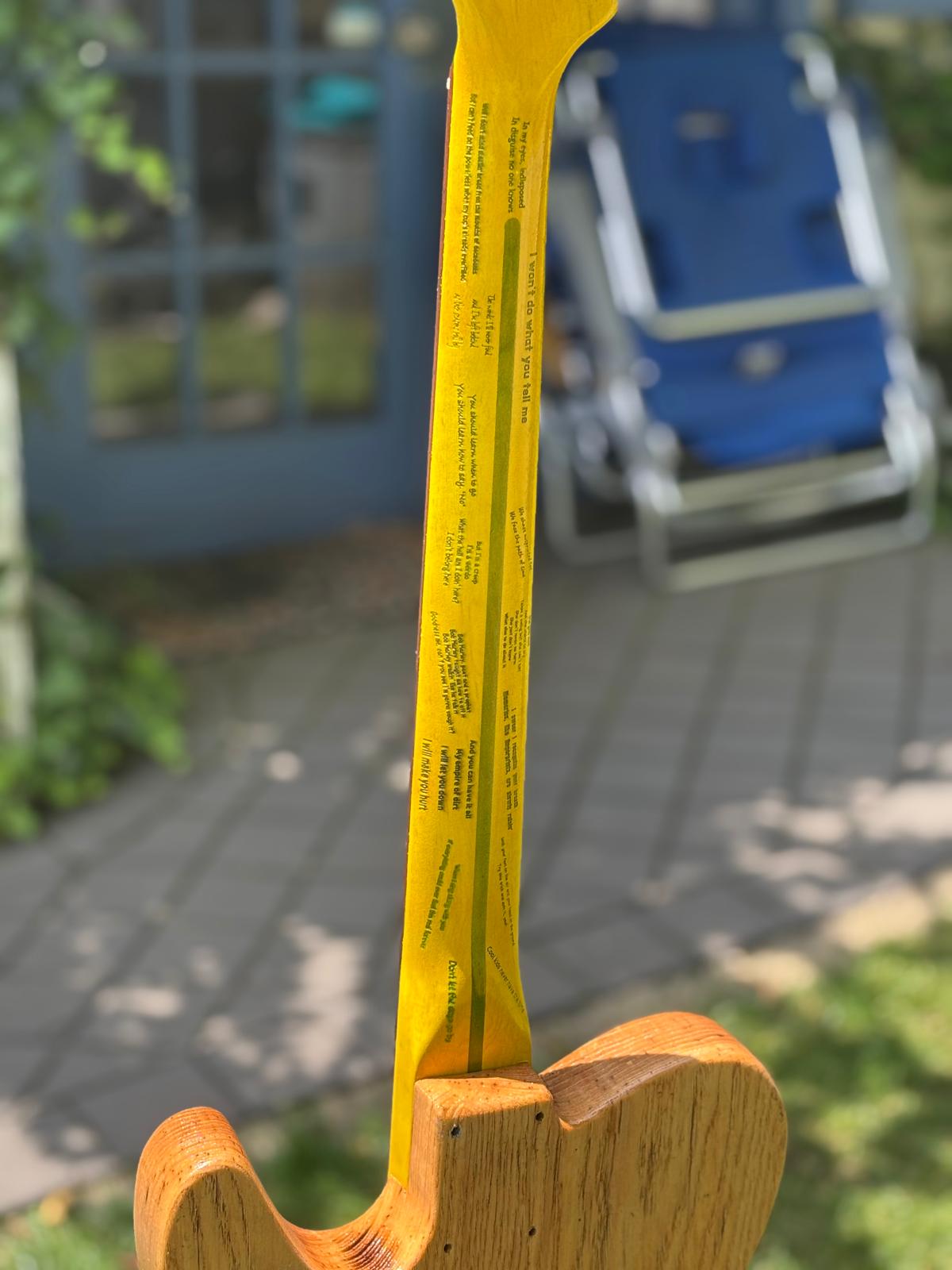 Finished electric guitar